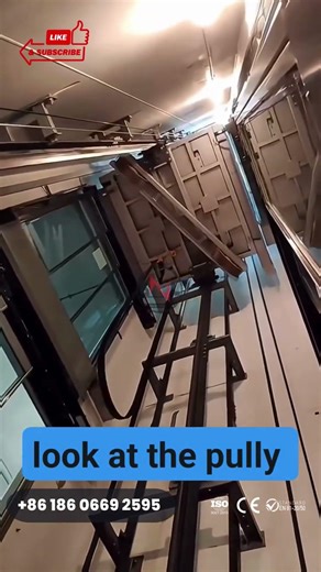 How does an elevator pulley work?