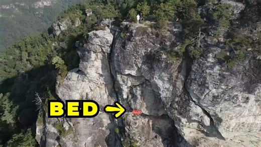 Watch what happens when a bed hangs 500 feet over a cliff - "One slip and he's gone"