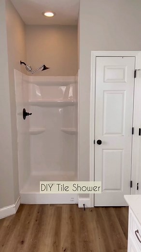 DIY Tile shower! This was a labor of love for sure! We did the entire renovation ourselves! When I say We, I mean my husband lol We ripped out the small plastic shower and linen closet. Then Turned it into a big custom tile shower! I have been so excited over how this turned out!😍 #showerrenovation #showerremodel #tileshower #showerinspo #showermakeover #homeremodel #diyhomeimprovement #homerenovations #budgetrenovations #diyhomerenovation #shower
