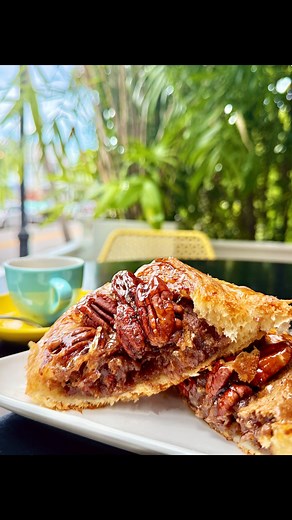 91 reactions · 8 comments | 不 Pecan Pie… in a danish?!  Yes please. Flaky, buttery layers on the outside… and that gooey pecan pie filling on the inside? Yep — we scoop the real deal right out of a homemade pie and bake it inside. 襤 Gooey, buttery, and loaded with toasted pecans. From our bakery to your plate 珞 The ultimate fall treat.  @moondogcafekw #musthave #pecanpiedanish #moondogbakery #keywestbakery #falltreat #pecanpie #bakedgoods | Moondog Cafe & Bakery | Facebook