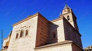 Castle-like stone construction of the Alhambra in the city of Granada