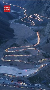 24K views · 712 reactions | The Duku Highway, which runs across the Tianshan Mountains with views of four seasons along the way, officially reopened on May 31 this year. At night, the highway is like a giant dragon winding through the mountains, full of a magnificent and mysterious atmosphere. It's worthy of being hailed as one of China's most beautiful roads! | China Focus | Facebook