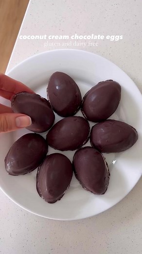 coconut cream filled chocolate easter eggs 😍 if you like mound bars or almond joys, you’ll love these! recipe in the comments! #eastereggs #chocolateeggs #moundbar #almondjoy #homemadeeastereggs #chocolateegg #coconutcream #diyeastereggs #eastertreats #easterdessert #eastertreat #easterdesserts #dairyfreedessert #dairyfreetreats #veganeaster #dairyfreechocolate #veganeastereggs #healthyeaster #nobakedessert #nobaketreats #vegantreats #vegandessert #kidfriendlyfood has | The Bigley Basics