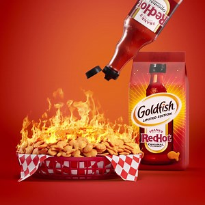 A blast of heat. A burst of flavor. #FranksRedHotGoldfish are coming in hot for a limited time only. | Goldfish