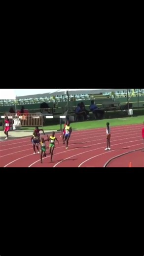 Female Athletes Compete in Track and Field Sprint