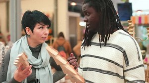 Learning a language with a native speaker. Individual lessons in English and French. A trip to the store to increase vocabulary on the New Year and Christmas theme. The teacher is actively gesturing.