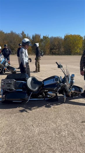 Day 1 of basic operator, learning how to safely upright a downed motorcycle. | TEEX Harley-Davidson Police Motor School