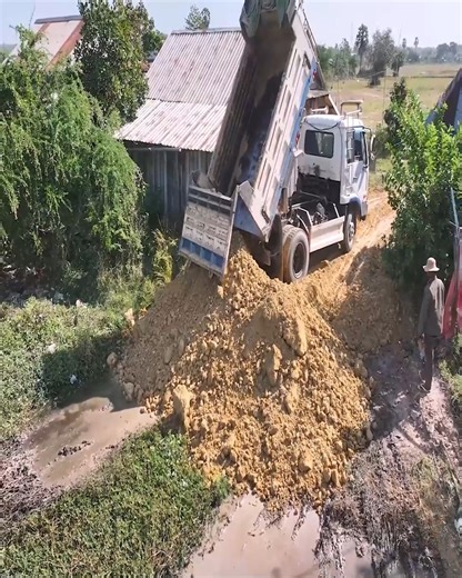 54K views · 795 reactions | Interesting task of boosting soil levels to prevent water overflow, with a mini dozer moving soil into the field | Excavator Bulldozer | Facebook