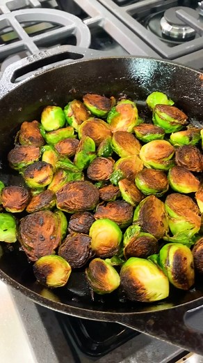 Crispy olive oil fried brussels sprouts with caramelized onions and garlic! | The Mediterranean Dish