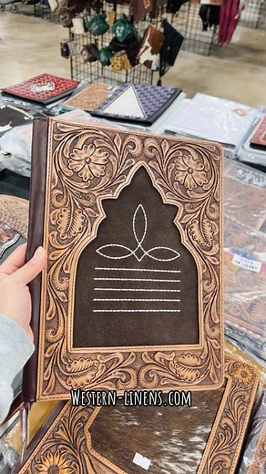 Elevate your desk with handcrafted Tooled Leather & Cowhide Folders. Western-linens.com | Western Linens