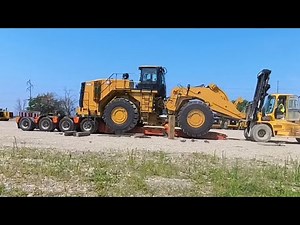 Loading up a brand new CAT 988K at the factory (extended version)