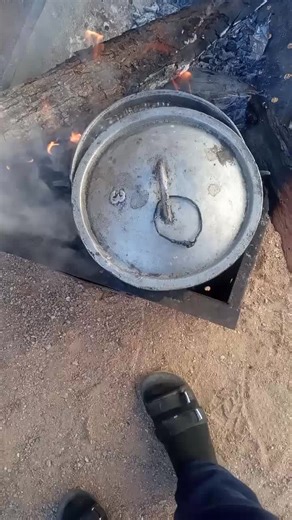 Cooking with Fire: Rustic Outdoor Pot Recipe