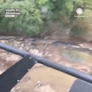 61K views · 1.2K reactions | Aerial footage captures the aftermath in Saluda, North Carolina, as a Duke Energy helicopter assesses the severe road damage - what's left of a road.  | AccuWeather | Facebook