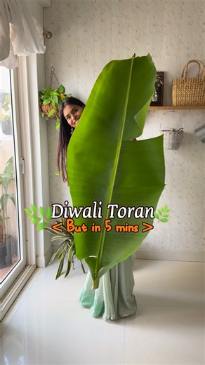 Harika Reddy🪷 on Instagram: "Episode41| Harika’s Festive DIY Dhamaka🌿🪷✨ Last year, when I shared “never seen before” banana leaf toran, it went crazy on the internet and so many of you recreated it! 💚 This time, I’m back with another unique (and stunning!) toran that you can make in just a few minutes. 🤩 What do you think about this idea? Don’t forget to save and share it with someone who loves festive decor! 🙌 (bananaleaf toran, diwali toran, unique toran, toranam ideas, mango leaf toran,