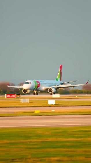 Embraer E190 Arrives During Golden Hour Light