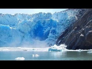 Massive Glacier Calving creating huge blue ice wall - Great event worth watching