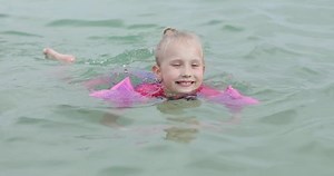 Beautiful Girl Armlets Learns Swim Cute Stock Footage Video (100% Royalty-free) 1016803363 | Shutterstock