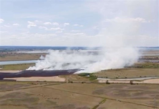 Drone footage captures wildfire near busy crossing