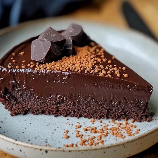 Chia Seed Chocolate Cake (No Flour) Ingredients: 1. 2 tbsp chia seeds 6 tbsp water (chia "egg") 2. ½ cup unsweetened cocoa powder 3. ½ cup almond flour or ground oats 4. ¼ cup maple syrup or honey 5. ¼ cup Greek yogurt or mashed banana 6. 2 large eggs (or substitute with flax eggs for eggless) 7. ¼ cup melted coconut oil or olive oil 8. 1 tsp vanilla extract 9. ½ tsp baking soda 10. ¼ tsp salt Directions: 1. Preheat Oven: 1.1. Preheat your oven to 350°F (180°C). Grease a cake pan with oil or lin