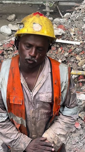Construction Workers at a Demolition Site: Safety First