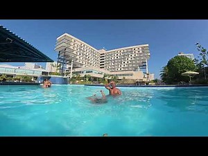 Piggyback ride challenge in the pool