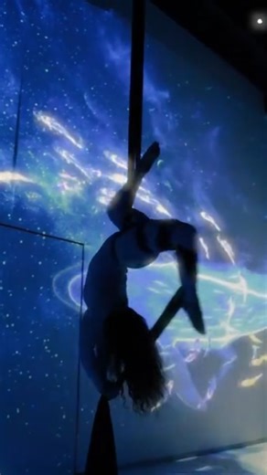 @spectramuseum on Instagram: "In this space, silence speaks. Light wraps around every motion. And for a moment… the room breathes with you. The experience has begun, Join us and become part of the art. 💙🌌 @aerialartsin #SpectraMuseum #DreamInMotion #WhereArtComesAlive"