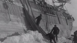 Shackleton's men begin unloading ship after it gets stuck