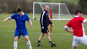 Sean Dyche puts a five-a-side team through their paces at Burnley's training ground