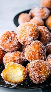 These mochi donuts are the ultimate cultural fusion dish. Chewy mochi center, crunchy, golden brown exterior, all rolled in sweet sugar. The perfect finger food dessert for any occasion. Full recipe ingredients and instructions at bit.ly/mochi-donuts . . . #keepingitrelle | Keeping It Relle