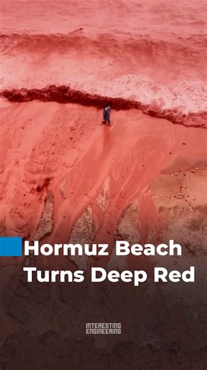 Rare rainfall on Iran’s Hormuz Island transformed its famous Red Beach as iron-rich soil washed into the sea, coloring the shoreline and nearby waters deep red. Even the Persian Gulf turned red. The short-lived phenomenon highlights the island’s iron oxide–rich landscape, which is also used locally for pigments and traditional products. 🎥 darresefid / IG | Interesting Engineering