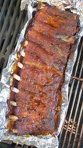 32K views · 199 reactions | Foil Boat Ribs are best of both worlds. Breaks down the connective tissues of the ribs real quick like (making them uber tender) but still gets you some amazing bark. And ribs are super cheap right now so you can feed a family for the cheap.  This post brought to you by and  #BaconAmbassador #BaconAmbassadorBoss #BBQRibs #PorkRibs #SpareRibs | GrillinFools.com | Facebook