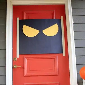 Turn your front door into a mummy using toilet paper! #HomemadeHack | Zillow