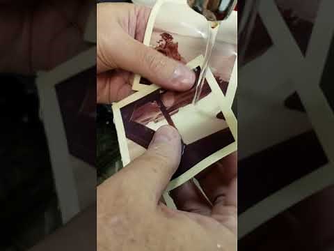 How to separate old stuck together photos