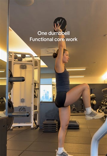 One dumbbell is all you need for this functional core exercise. Holding the weight overhead forces your core to stabilize while the knee raises target the lower abs!! #personaltrainer #fyp #workoutforwomen #coreworkout