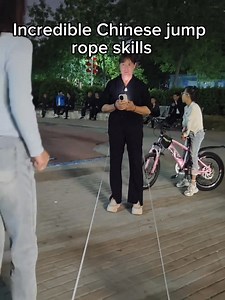 52K views · 4.7K reactions | Prepare to be amazed! In this video, a woman showcases her Chinese jump rope skills with flawless rhythm and mind-blowing tricks. Chinese jump rope, or Tiao Pi Jin in Chinese, is a timeless childhood activity that has been enjoyed by generations of children in #China. #TrendinginChina | Xi's Moments | Facebook