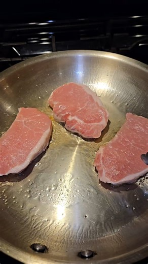 Tony Moraco on Instagram: "Pork chops on a stainless steel pan"