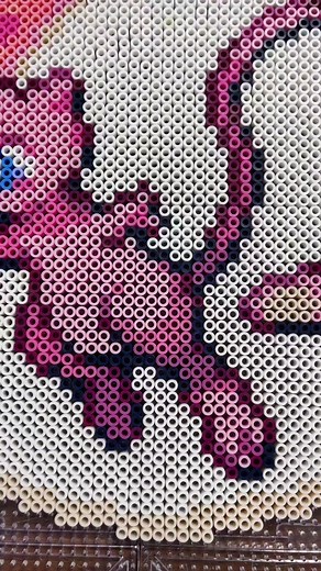 Creating a Stunning Mew Perler Bead Design with Tape Method