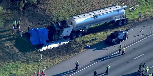 8 people killed in fiery crash after tractor-trailer hits van, authorities say
