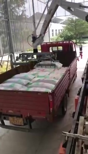 Efficient Robotic Arm for Loading Sacks onto Trucks