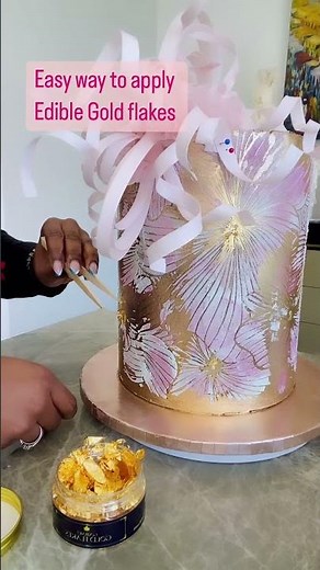 Applying Edible Gold Flakes to a Cake