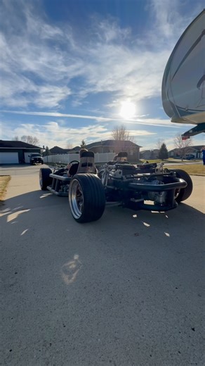 Brian King on Instagram: "Build update: This thing is coming together beautifully! 🔥 The carbon fiber absolutely pops in the sunlight – looks insane. That chassis is SO rigid… check out the right front wheel lifting clean off the ground just pulling out of the driveway! And the best part? My son towed me down the road for a quick test – steering feels spot-on and the whole car is eager to go. Can’t wait to get it fired up! #Exocet #KitCar #CarbonFiber #GarageBuild #FatherSonProject"