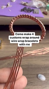 Wire wrap open cuff bracelets that wrap around. I absolutely love making these. You will need 26 gauge round wire for your weaving wire and 18 gauge two pieces round wire for the framing. 22 gauge for the swirls round wire, raw copper. You can find the wire at Rio Grande jewelry supply. these turned out absolutely incredible and if you want to add Bizz, I would suggest grabbing different natural stone beads that work for your pieces tweezer nose pliers are a must and flush cutters I find those o