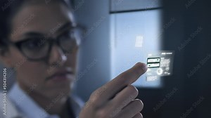 Female scientist computer engineer holding microchip hardware processing data,cyber security science nanotechnology concept,graphic animation