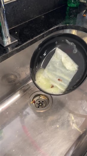 How to clean a greasy skillet with paper towels without ruining the sponge. | YumMakers