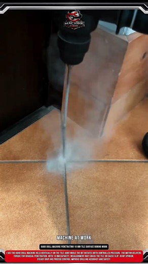 Hand Drill Machine Penetrating 10 mm Tile Surface During Work