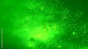 Fiery flashes of green fireworks. Explosions of fire of the festive global firework.