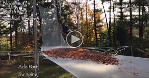 Trapeze Artist Demonstrates Principles of Inertia With Slow Motion Fall Into Leaves