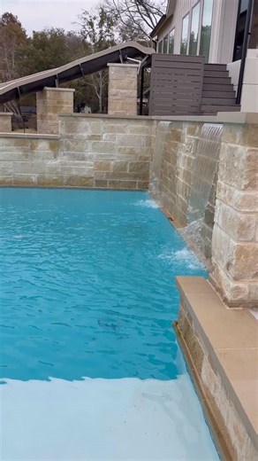 Waterfalls flowing, slide ready, and a putting green for the finishing touch ⛳️ This isn’t just a pool it’s a full backyard experience. Happy Holidays from our favorite place to unwind ✨ #CustomPool #LuxuryPool #BackyardPool #DreamBackyard #PoolDesign | Cedar Creek Pools | Facebook