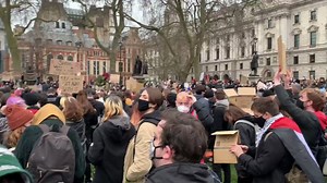 Protesters rally for murder victim Sarah Everard in London's Parliament Square