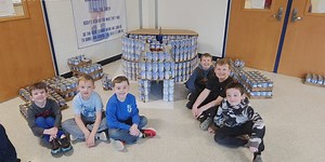 Students recognized for building massive canned food structures for a good cause